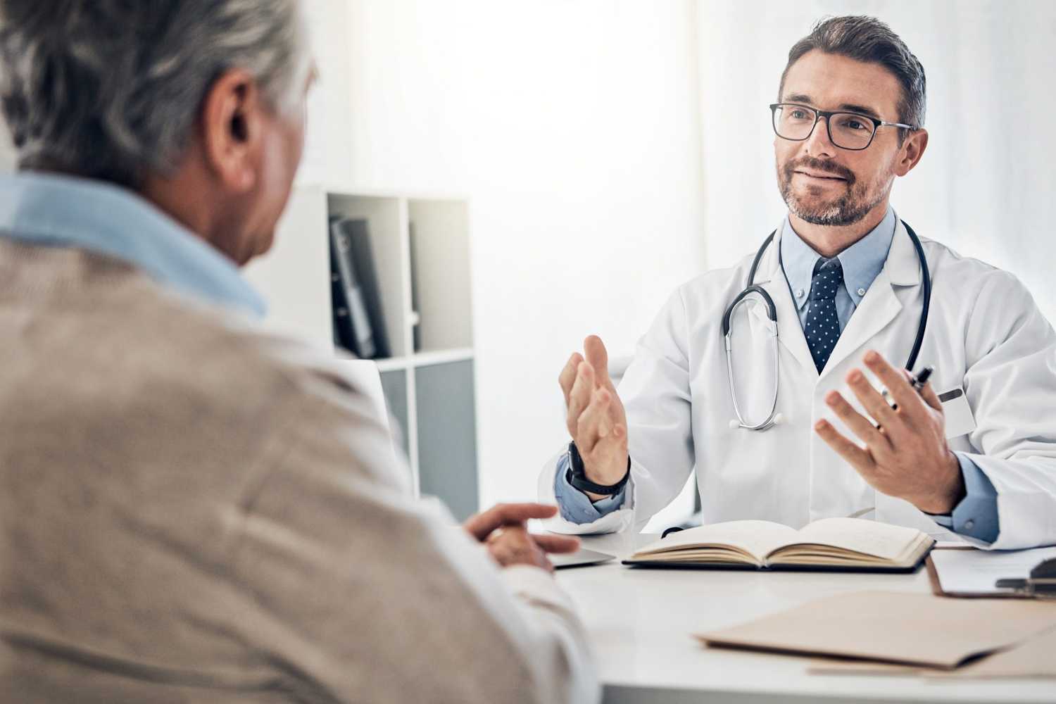 Doctor Completing an IME Review