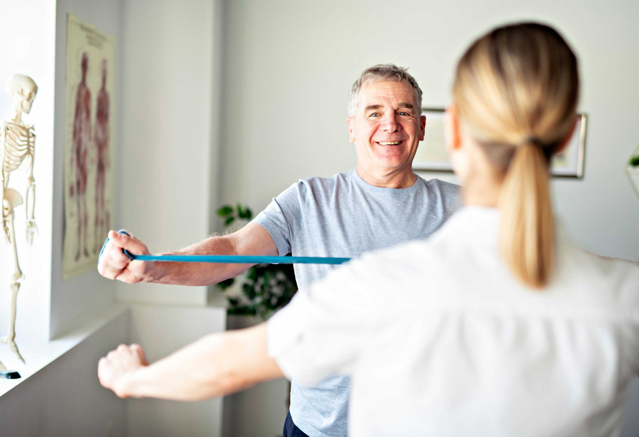 male patient at a physical therapy appointment with a corvel ancillary service provider