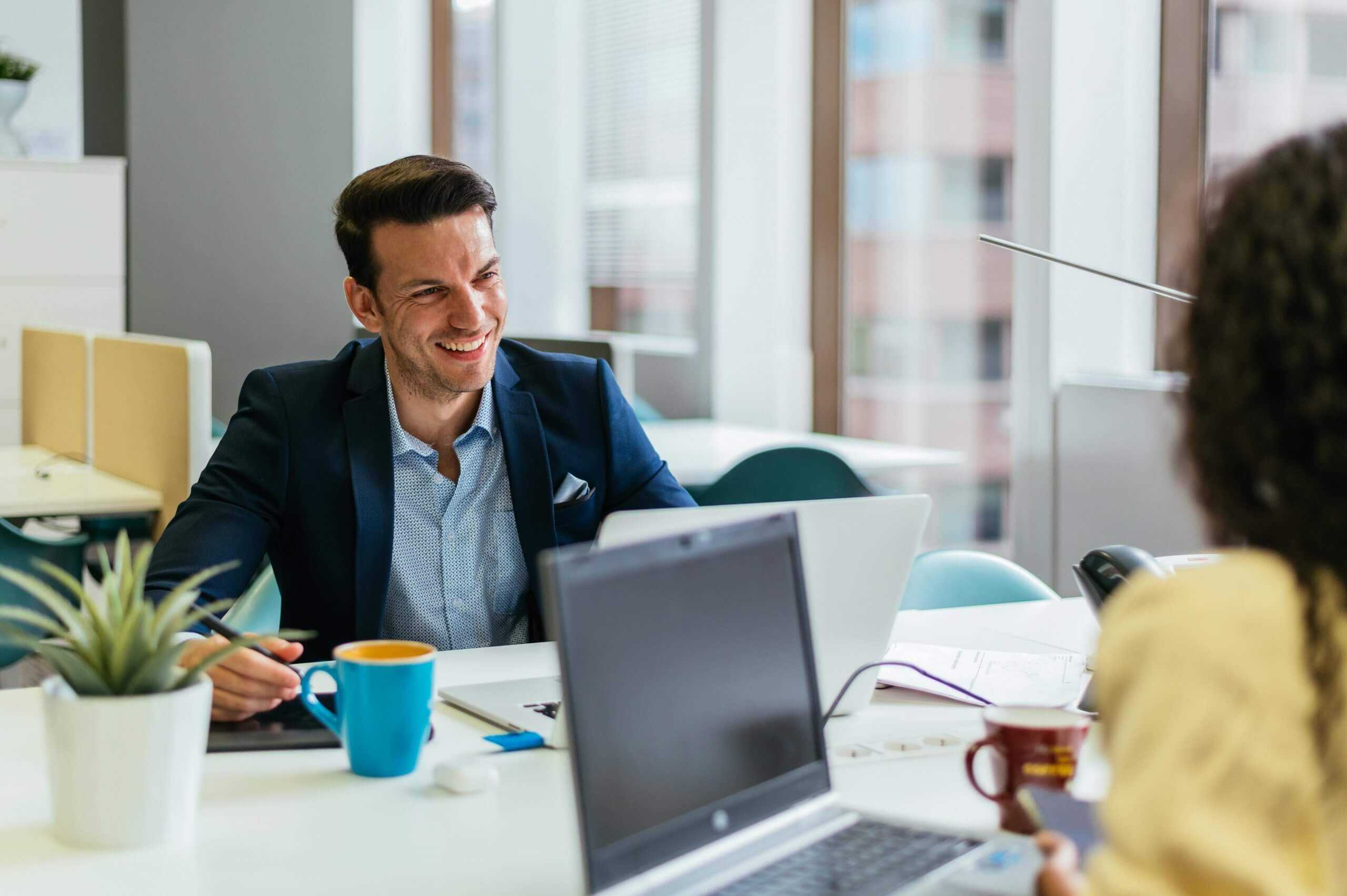 corvel manager in an office interviewing a candidate for a corvel career